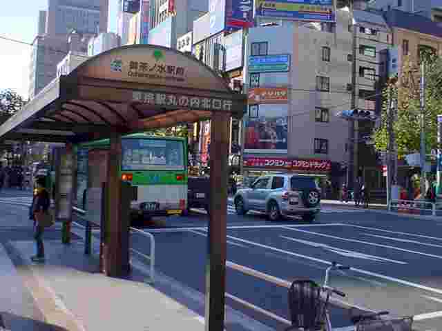 The bus stop at the end of the bridge